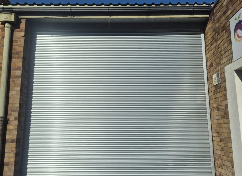 Commercial roller shutter installation project for warehouse entrance in London